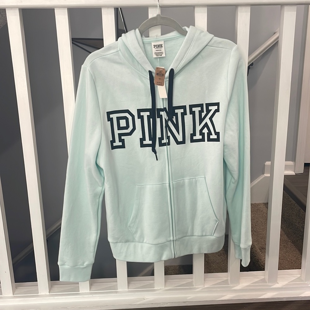 Zip up PINK hoodie.